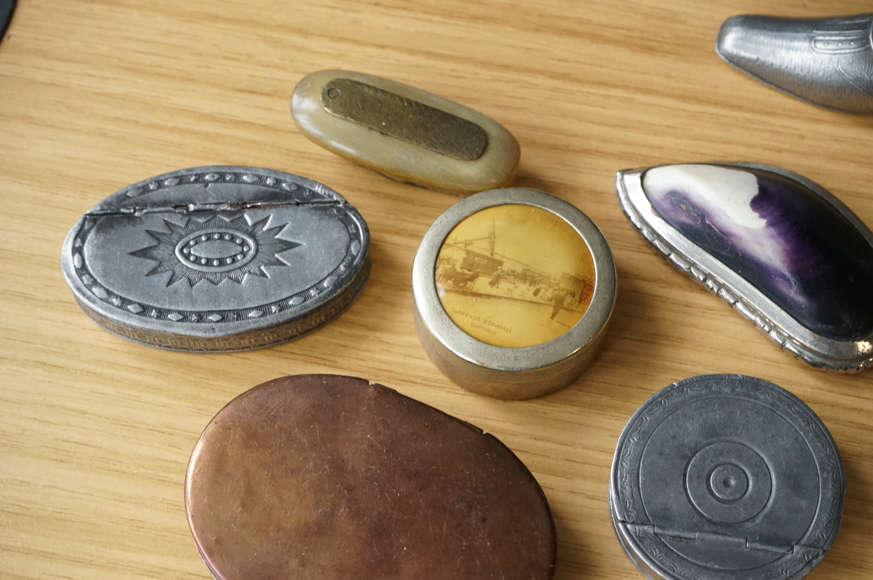 A collection of mixed metal stuff boxes including a novelty cello shaped box being 12cm long